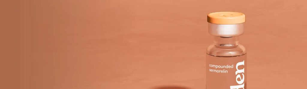 Vial of compounded sermorelin from Telezen MD on a warm peach background.